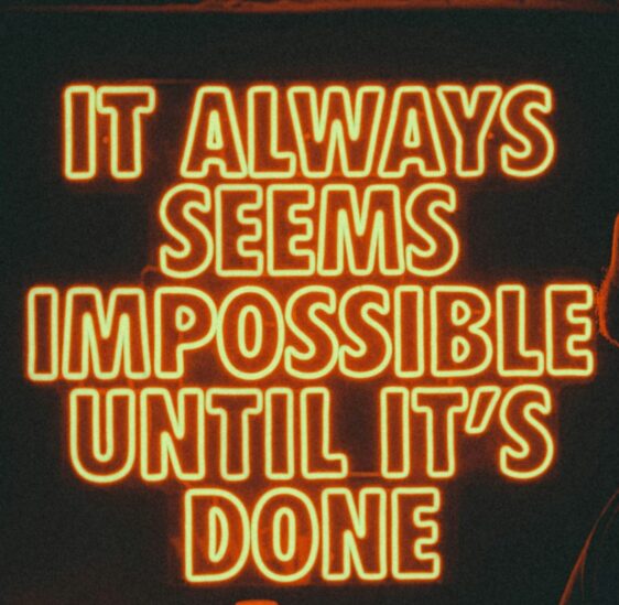 Sign stating It always seems impossible before it's done.